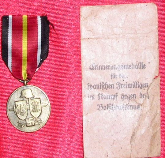 Blue Div medal and packet.jpg